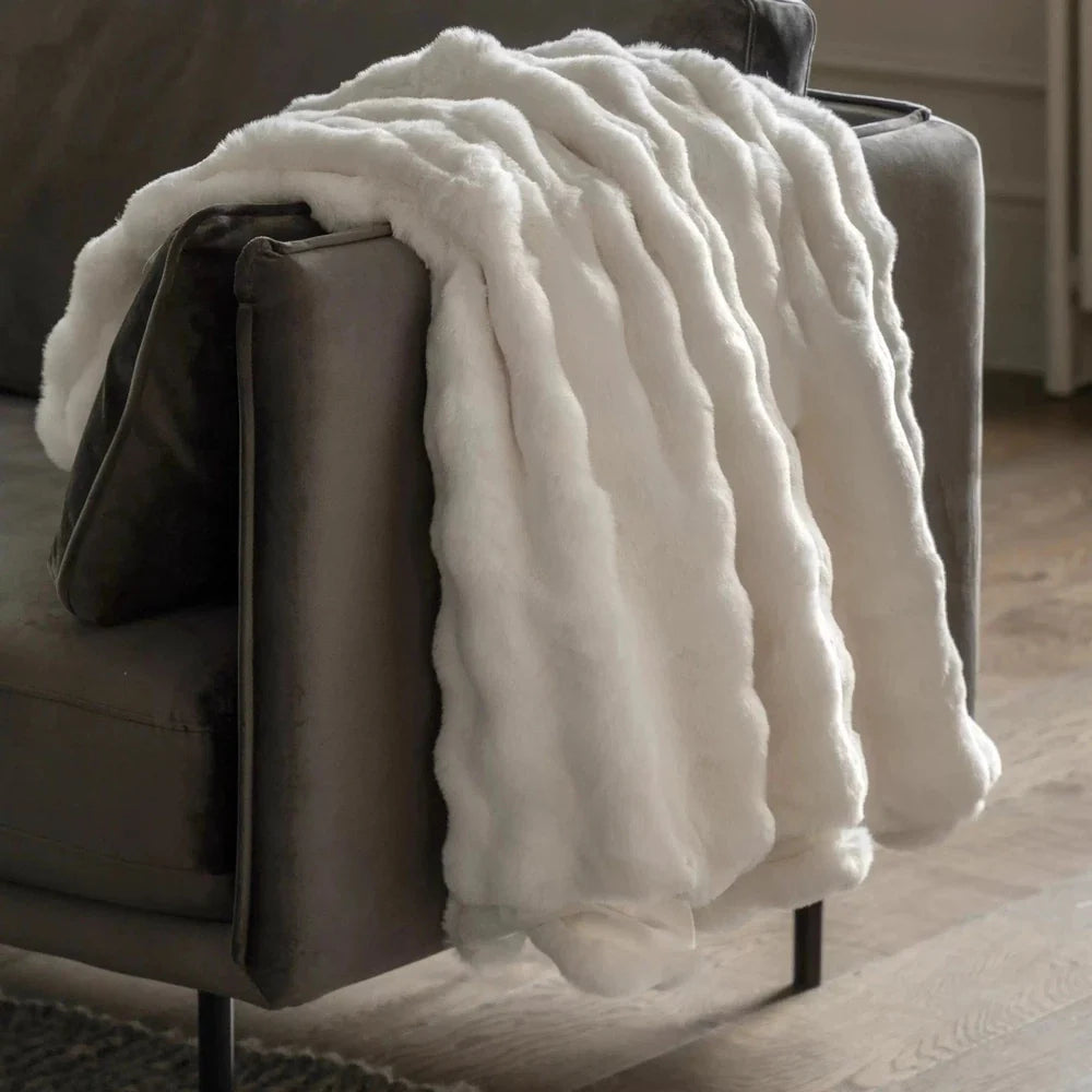 XL Marshmallow Faux Fur Throws — Pair — product and styling photograph