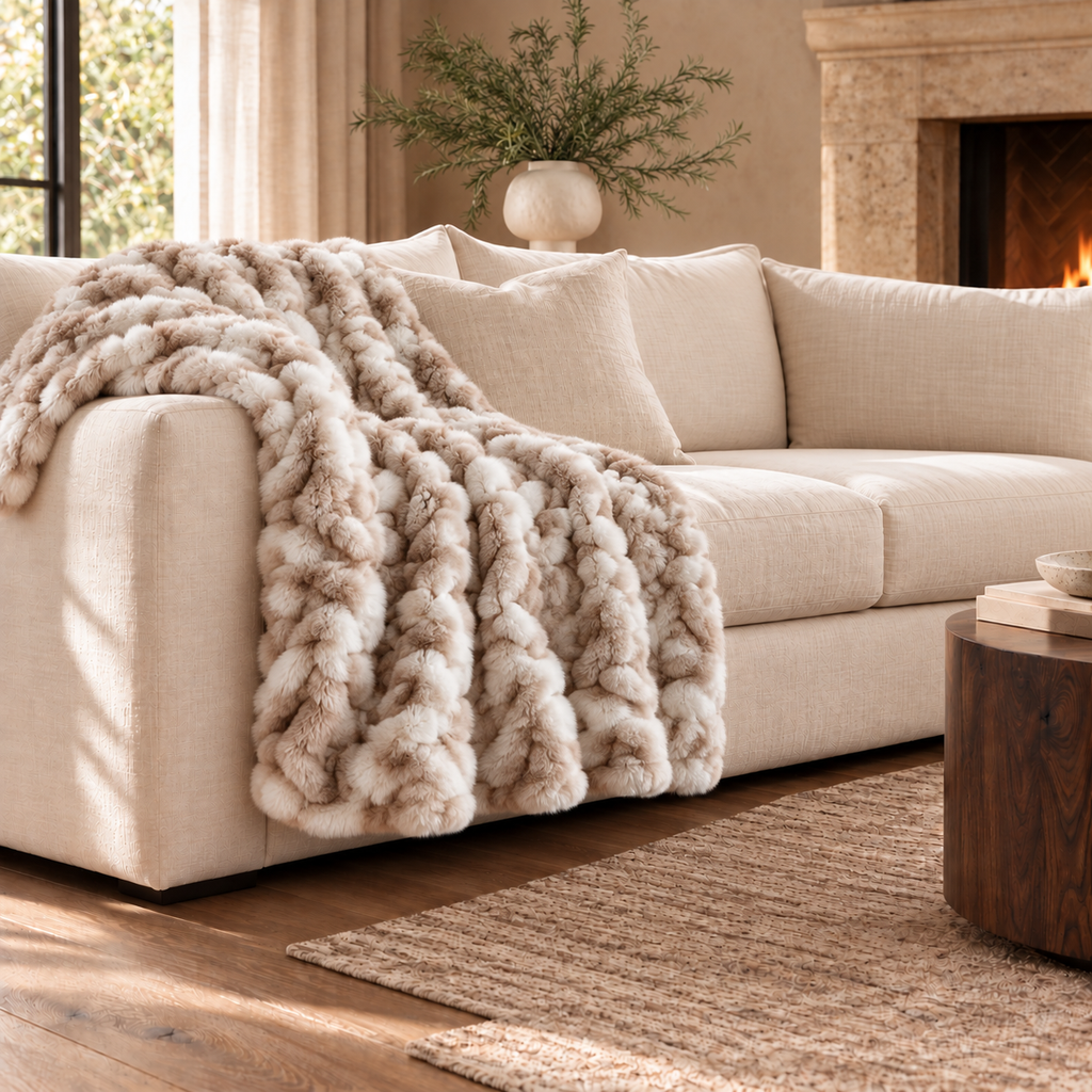 Deco Luxe Ruched Faux Fur Throw — product and styling photograph